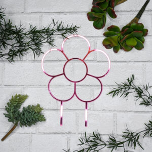 pink daisy trellis with plants